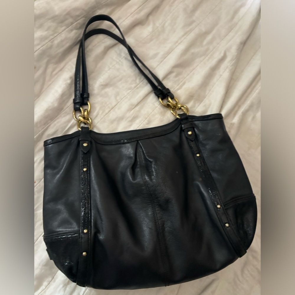 Black coach purse. In good condition
